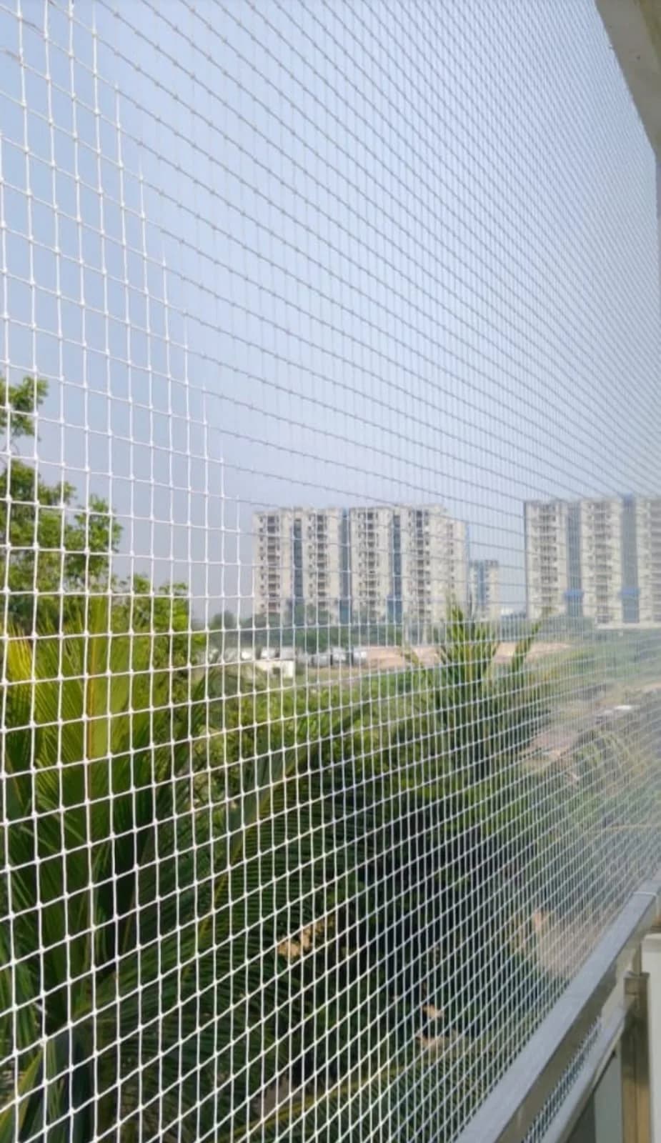 Ceiling-mounted cloth drying hanger fixed on a balcony soffit
